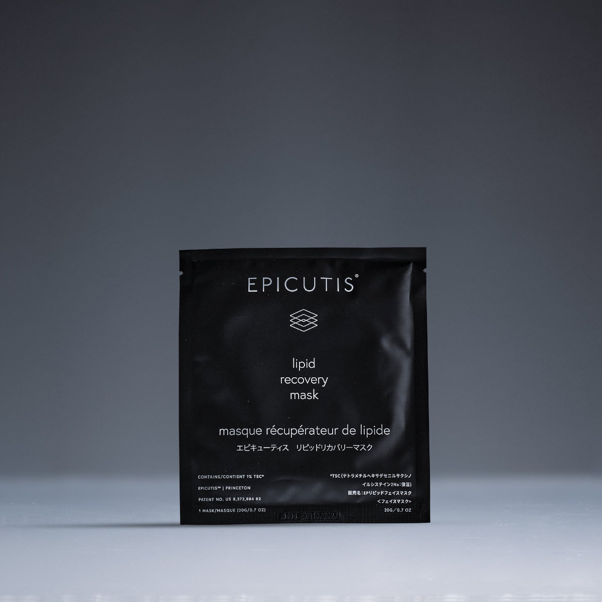 A black packet labeled "EPICUTIS lipid recovery mask" stands upright against a plain gray background.